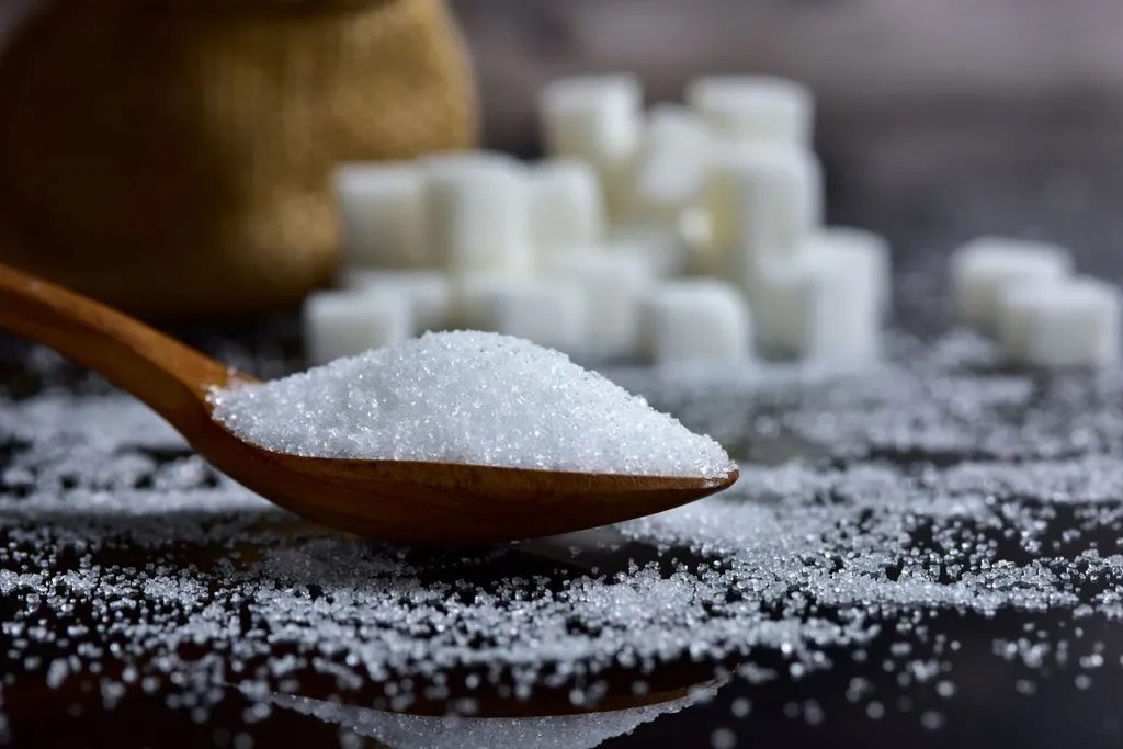 a spoon of granulated sugar