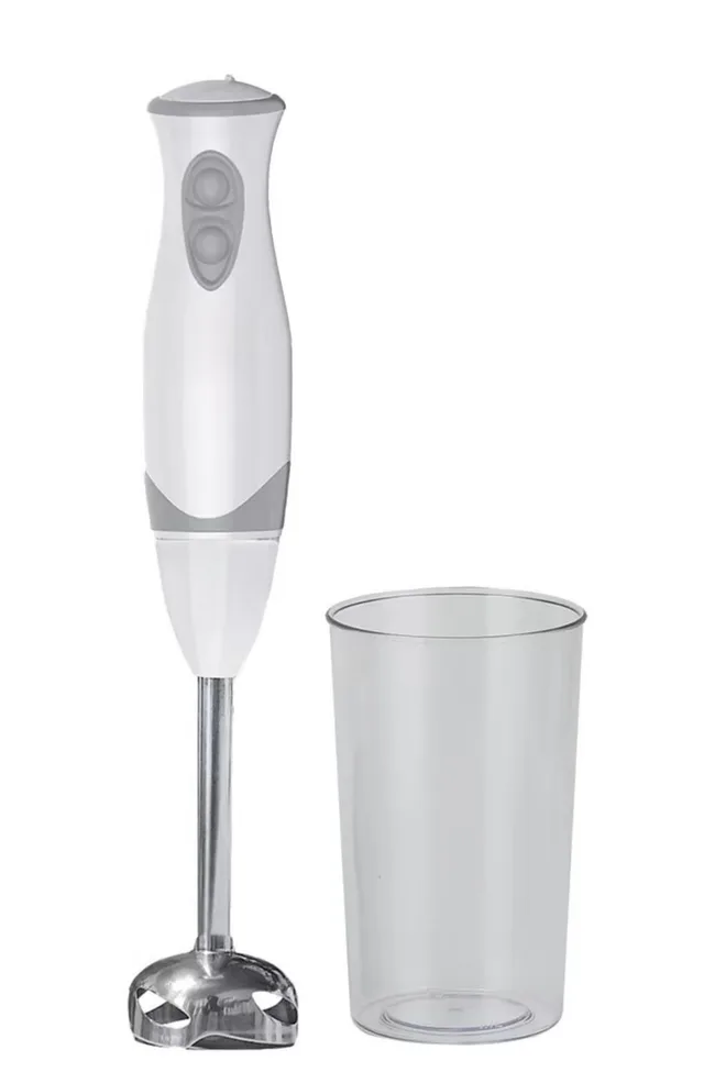 Hand blender with two buttons and a clear plastic cup next to it, both standing upright.