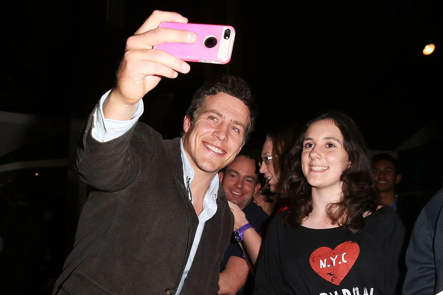 Stephen Peacocke takes a selfie with a fan