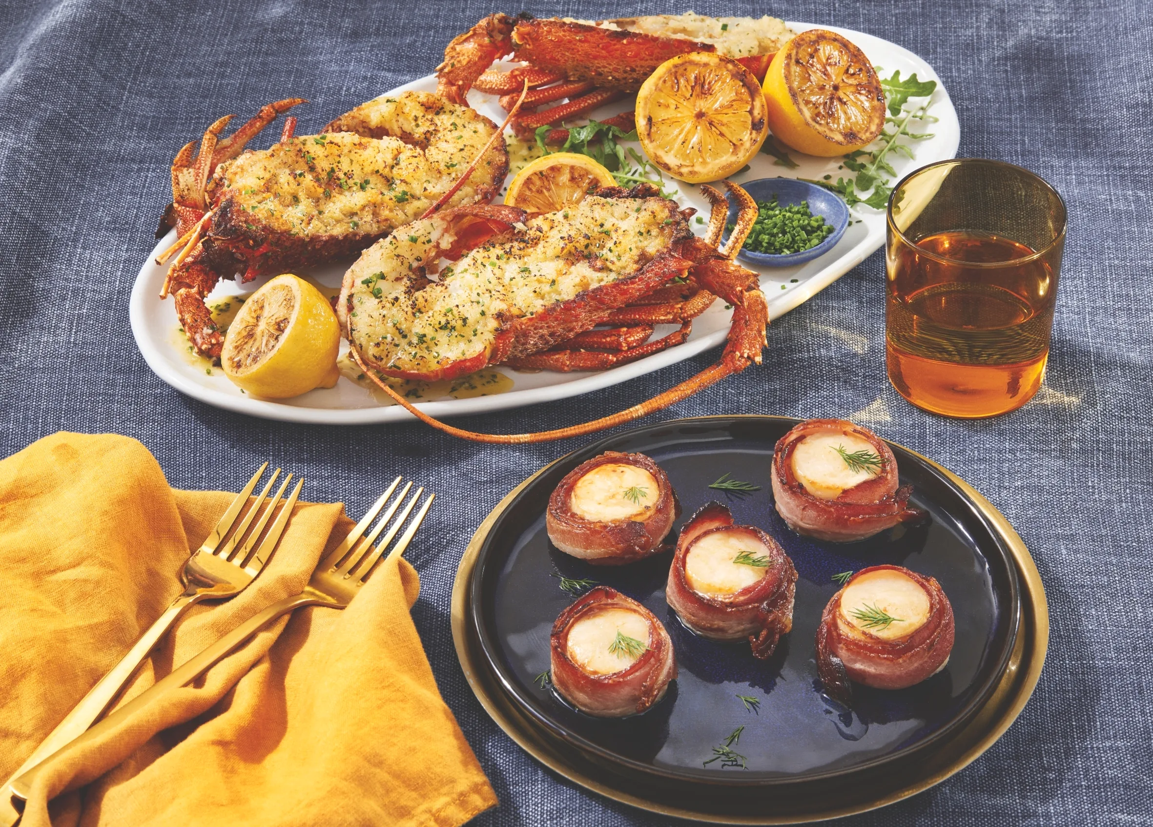 Split rock lobsters and maple bacon scallops