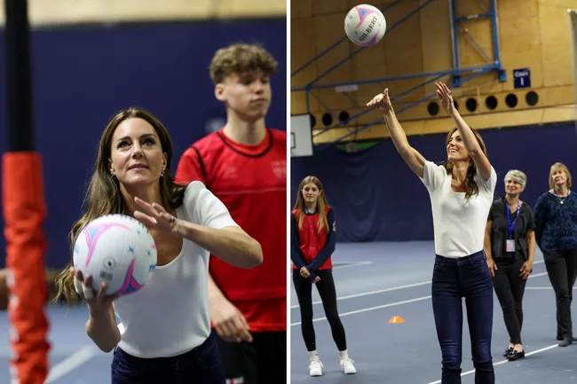 Royal family member playing netball, shooting ball, indoor sports venue, surrounded by other participants.