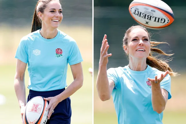 Royal family member playing rugby in a light blue sports shirt, smiling while holding and catching a rugby ball.