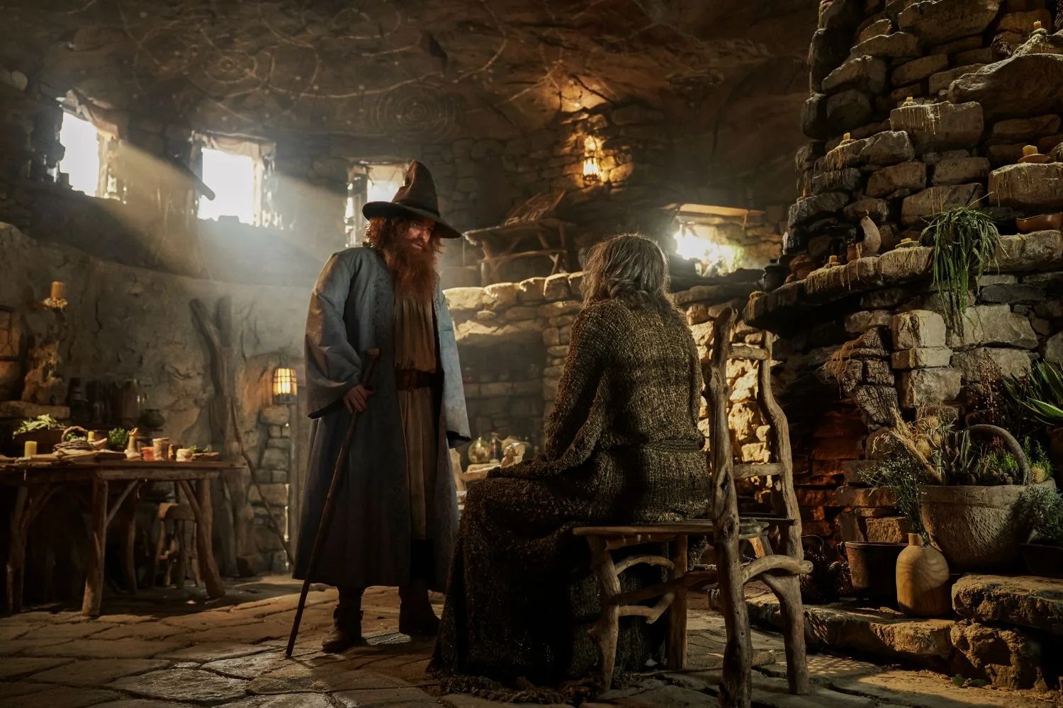 epsiode still fron the new season of the lord of the rings: the rings of power show Rory Kinnear as Tom Bombadil