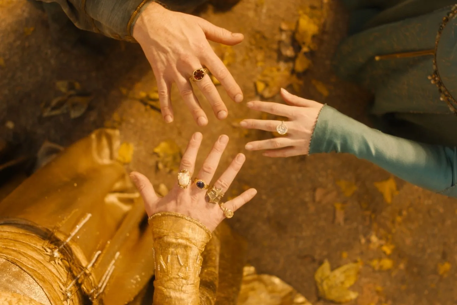 episode still from new season shocking characters with rings on their fingers