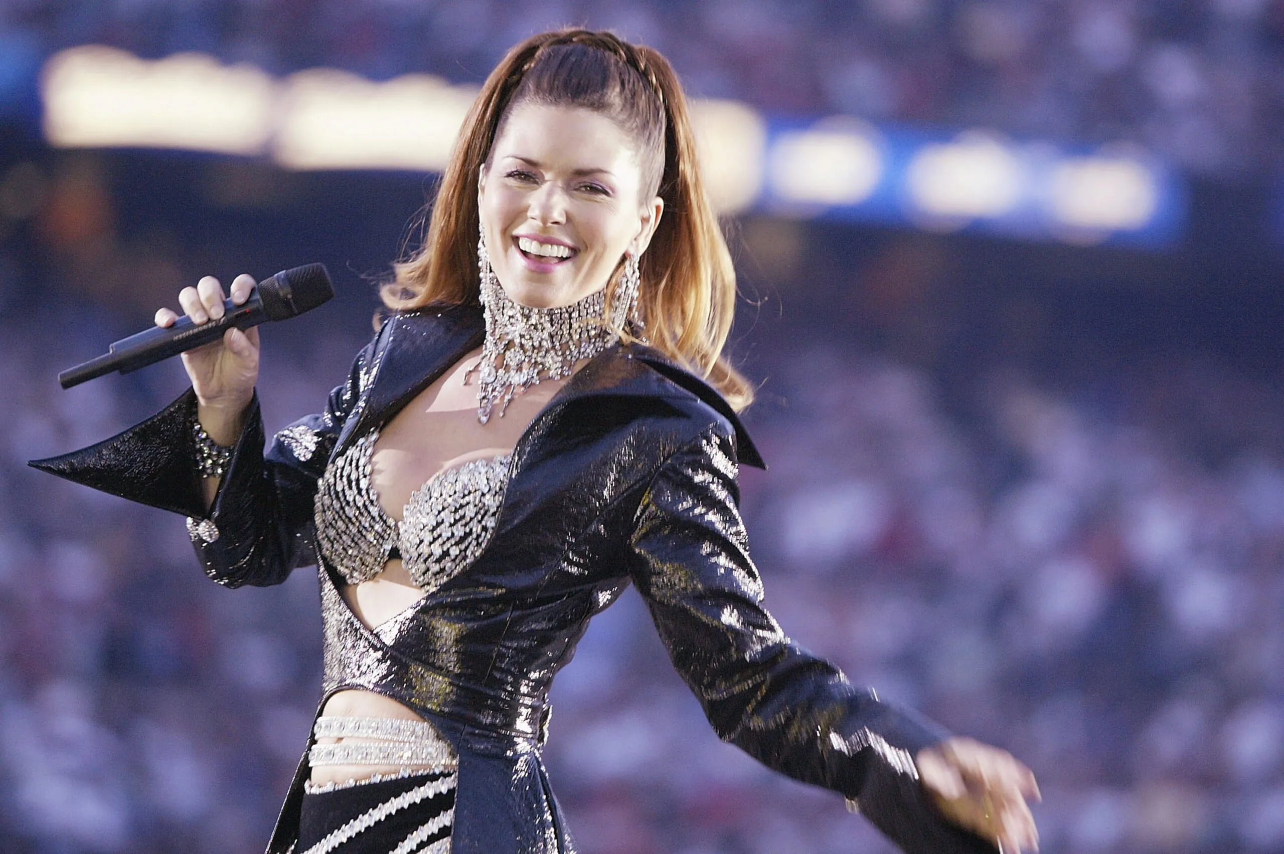 SAN DIEGO - JANUARY 26: Singer Shania Twain performs during halftime of Super Bowl XXXVII between the Tampa Bay Buccaneers and the Oakland Raiders on January 26, 2003 at Qualcomm Stadium in San Diego, California. (Photo by Al Bello/Getty Images)