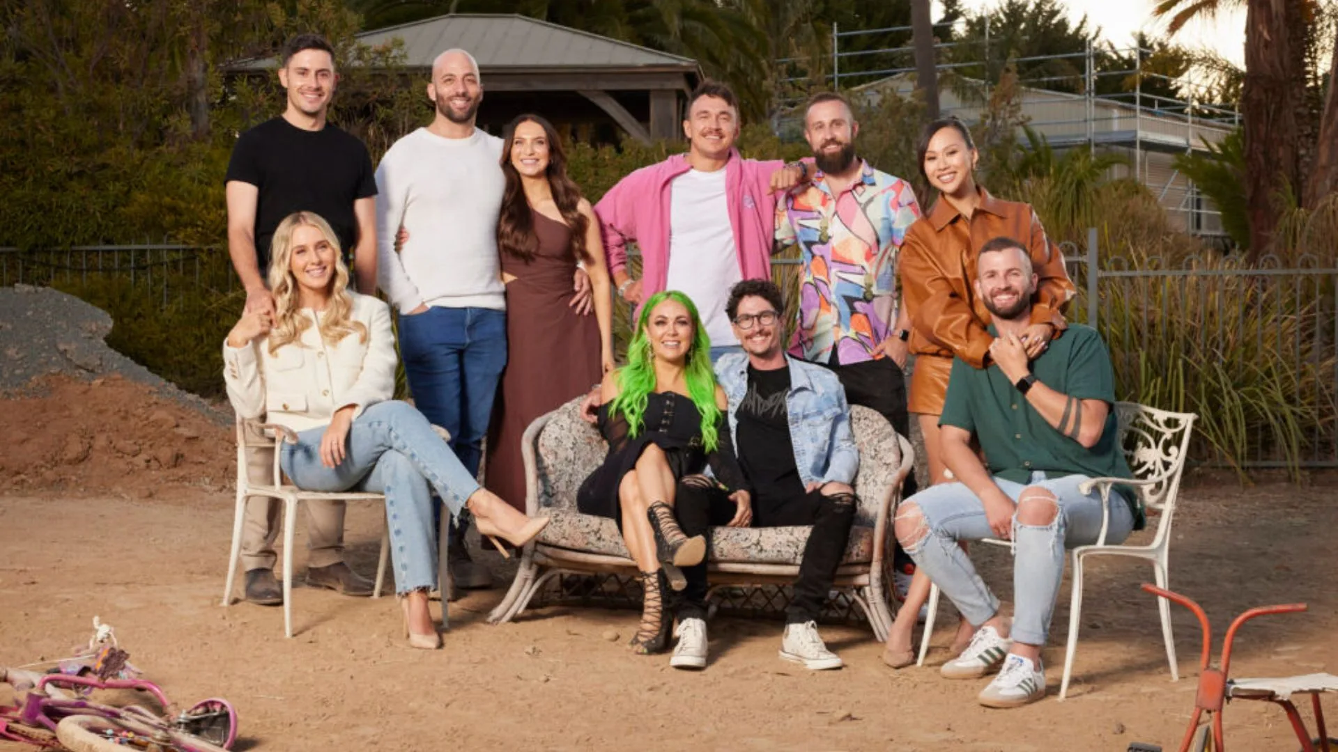 Group photo of "The Block 2024" contestants outdoors with various casual outfits and poses.