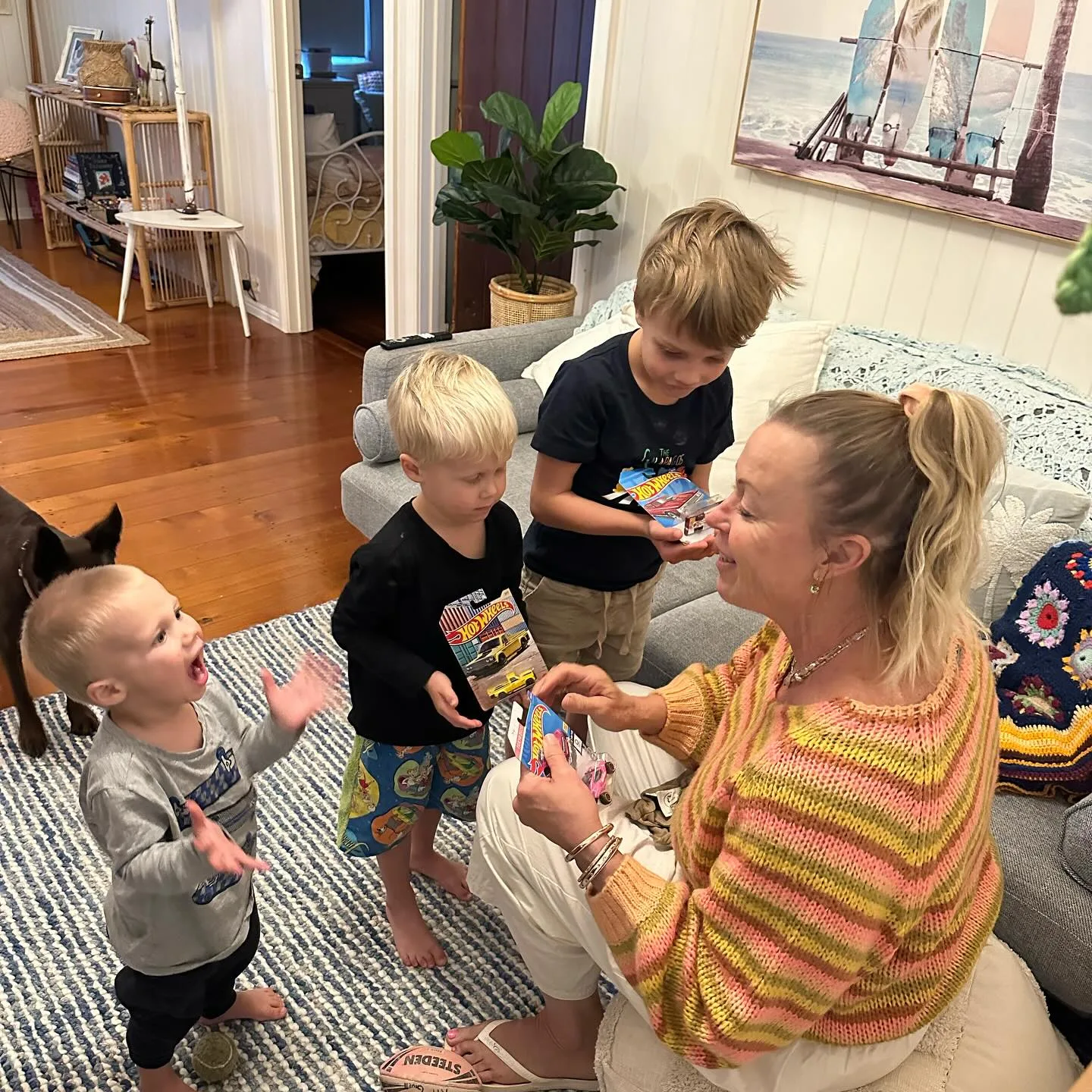 lisa curry gives her grandchildren hot wheel cars