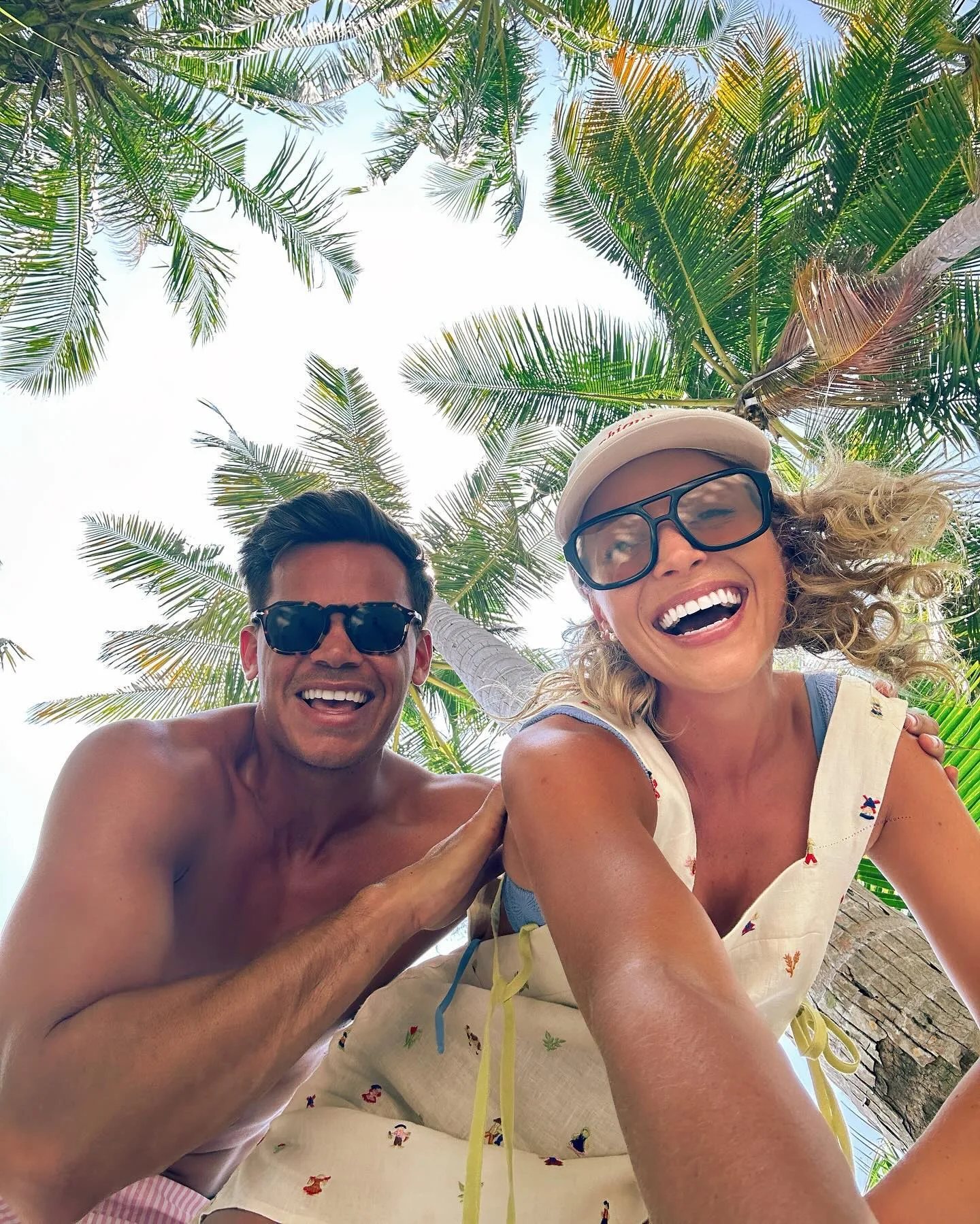holly kingston and jimmy nicholson with palm trees