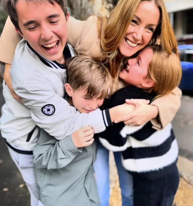 lisa campbell cuddles her three children