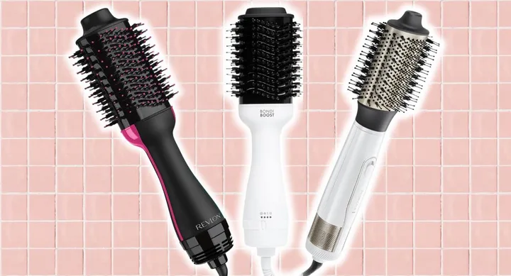 Three hair dryer brushes on a pink tiled background: Revlon black/pink, Bondi Boost white, and a white brush with metal tip.