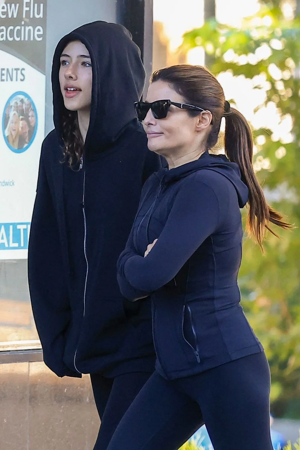 ada and james' daughter scout walk together in the street