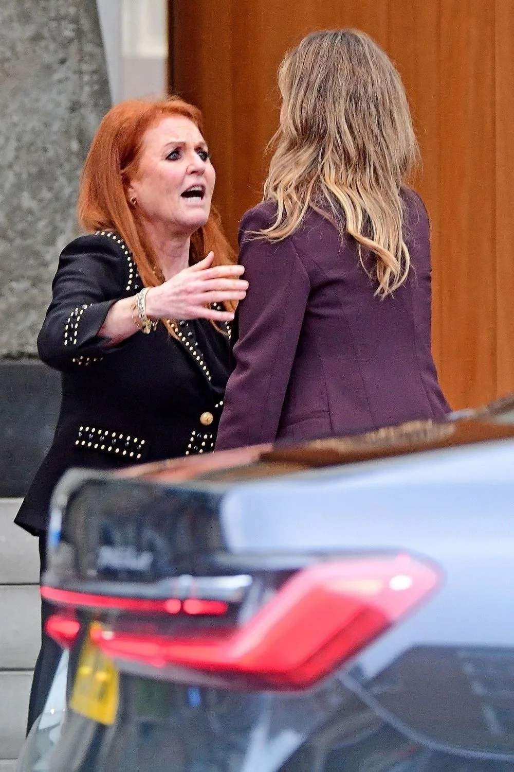 sarah ferguson and delta goodrem lean in for a hug