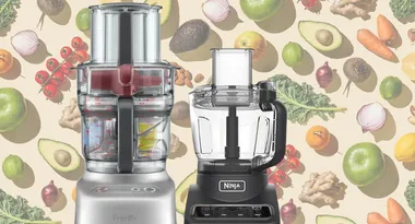 Two food processors, Breville and Ninja, with a colorful vegetable background.