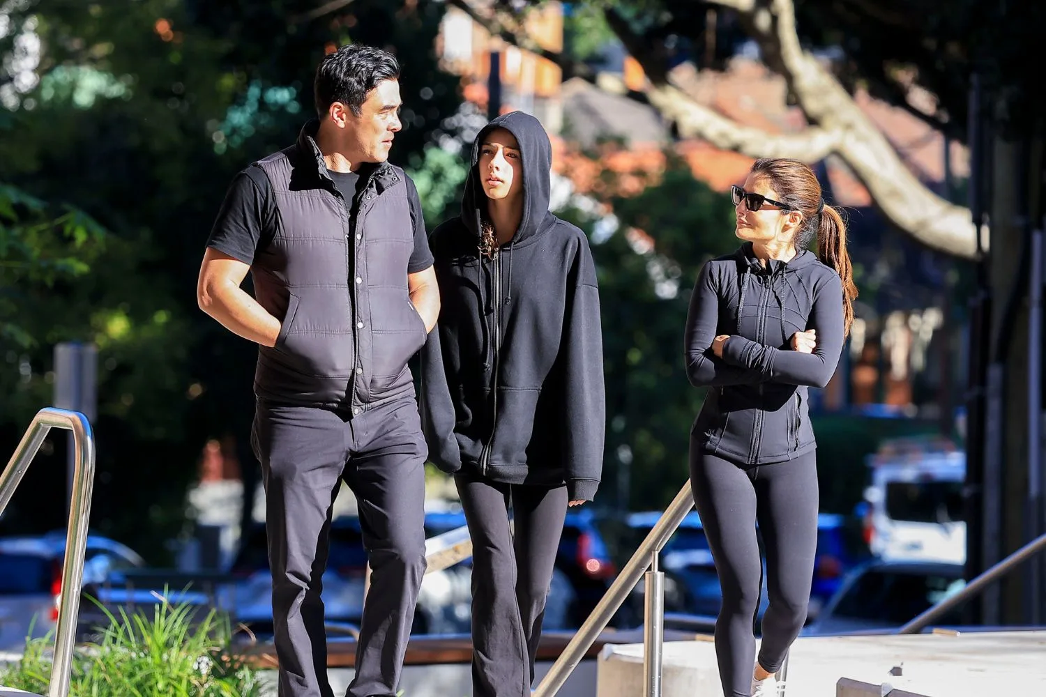 james stewart and ada nicodemous with james' daughter scout all wearing all black outfits