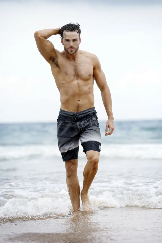 joshua orpin shirtless on the beach