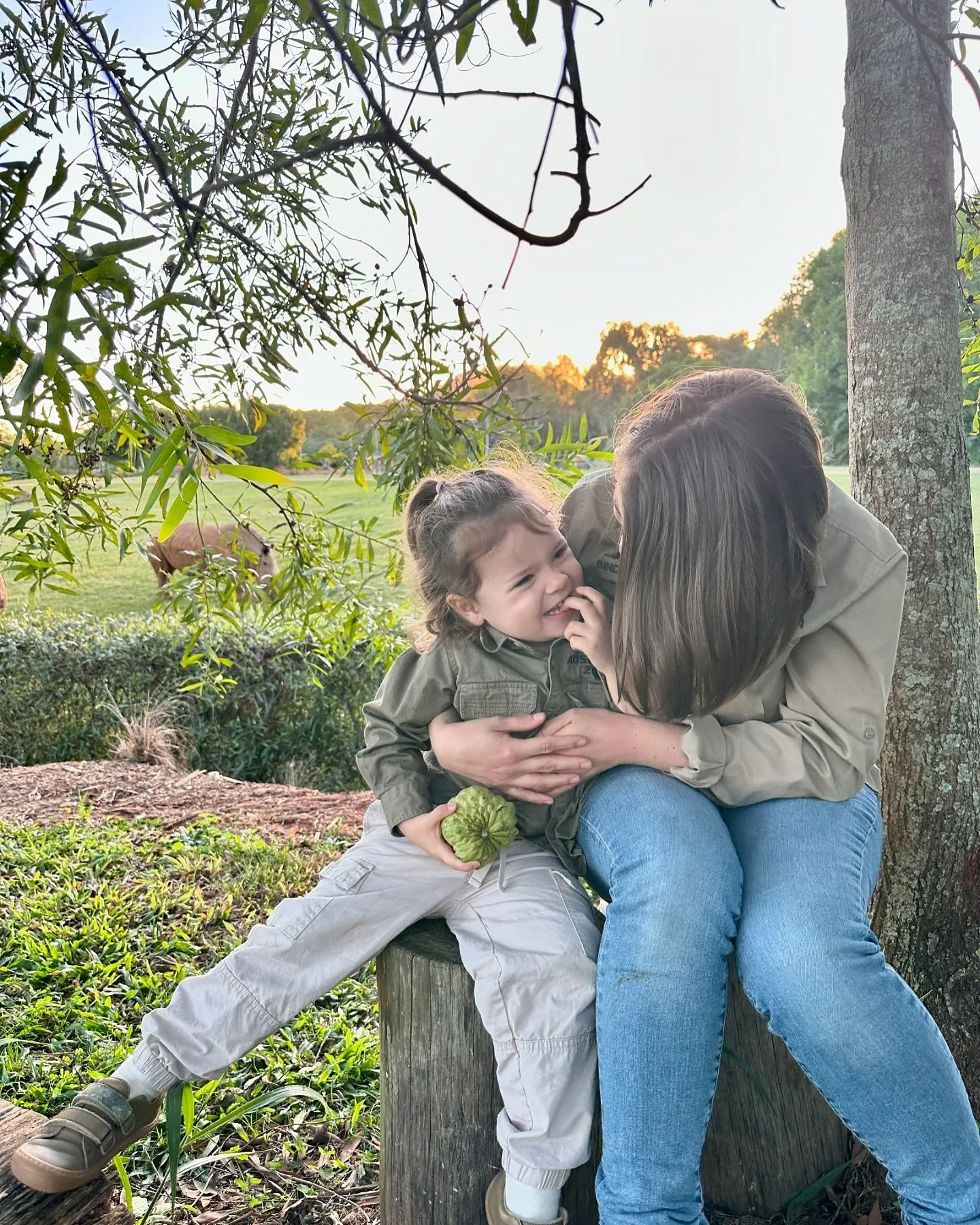 bindi irwin hugging her daughter grace warrior