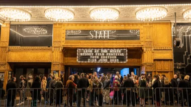 Crowd outside State Theatre for Sydney Film Festival 70th Edition, June 2023, under illuminated marquee.