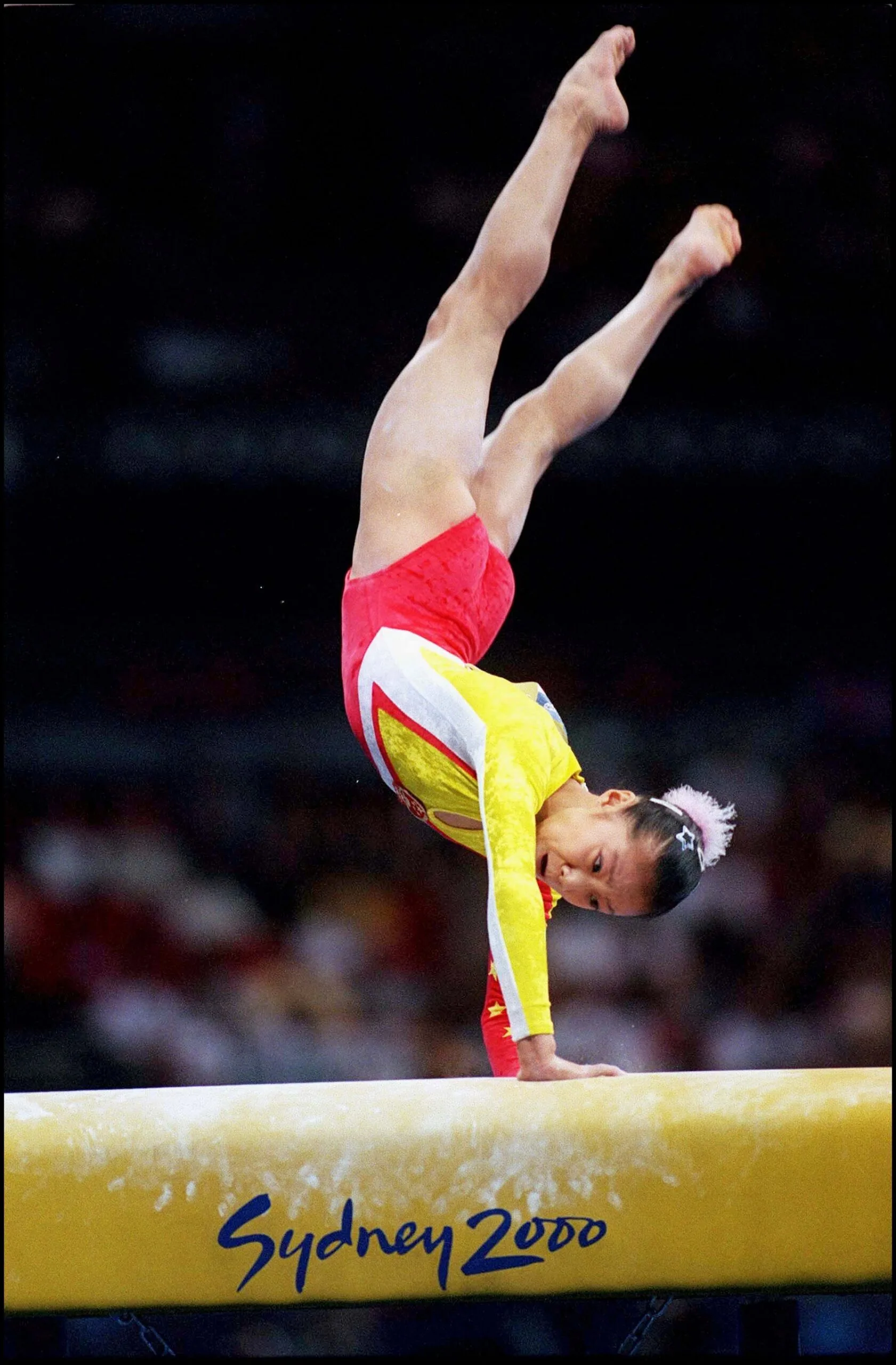 AUSTRALIA - SEPTEMBER 24:  Sydney Olympics: Women's Gymnastics in Sydney, Australia on September 24, 2000 - Fangxiao Dong (chi), women's vault.  (Photo by Pool JO SYDNEY 2000/Gamma-Rapho via Getty Images)