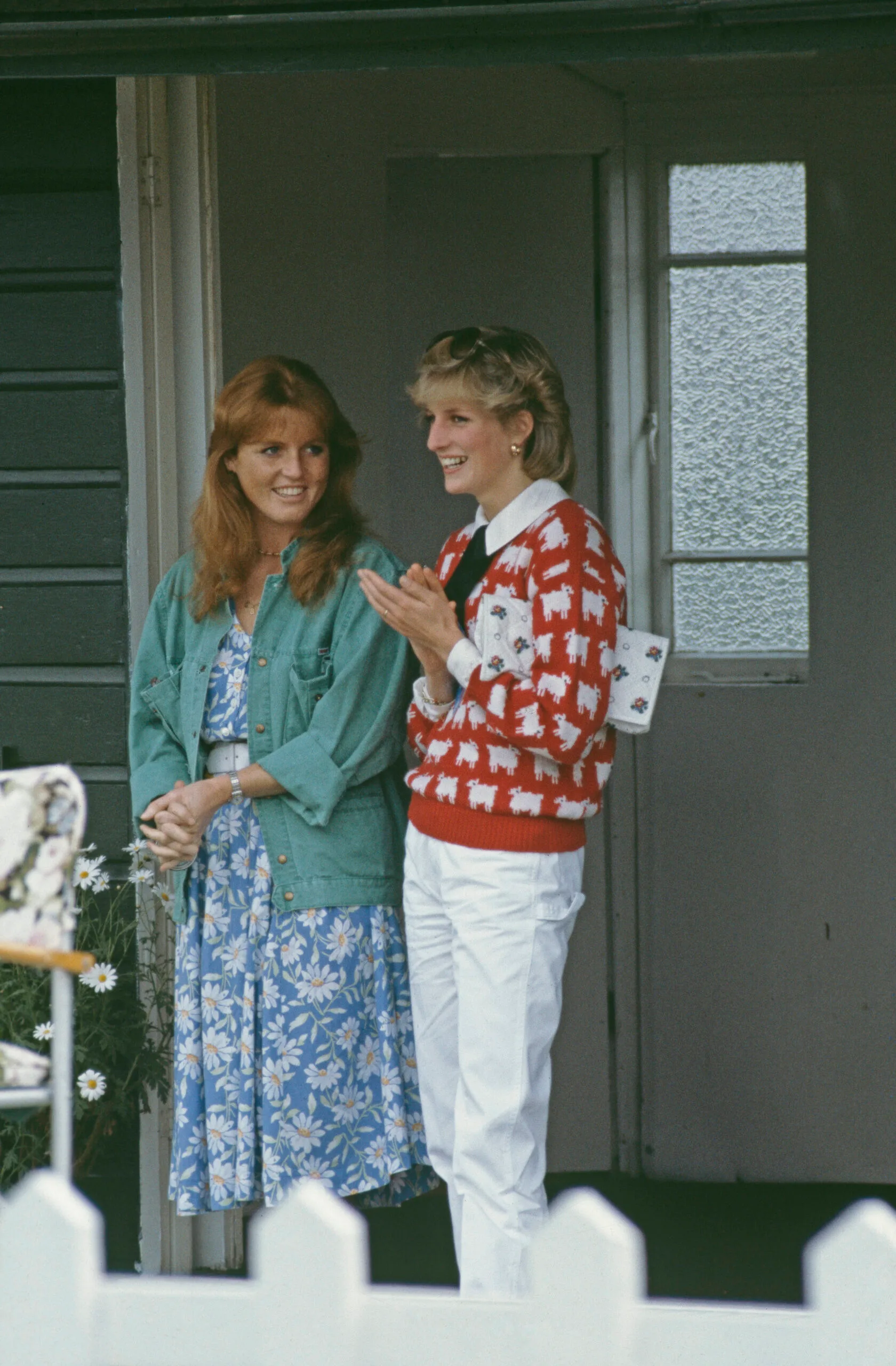 Diana, Princess of Wales (1961 - 1997) and her friend Sarah Ferguson attend a polo match at Smith's Lawn, Guards Polo Club, Windsor, June 1983. Diana is wearing a Muir and Osborne 'black sheep' sweater. (Photo by Princess Diana Archive/Getty Images)