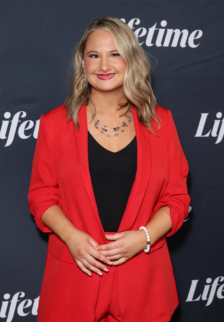 gypsy rose blanchard wearing a red outfit on a carpet