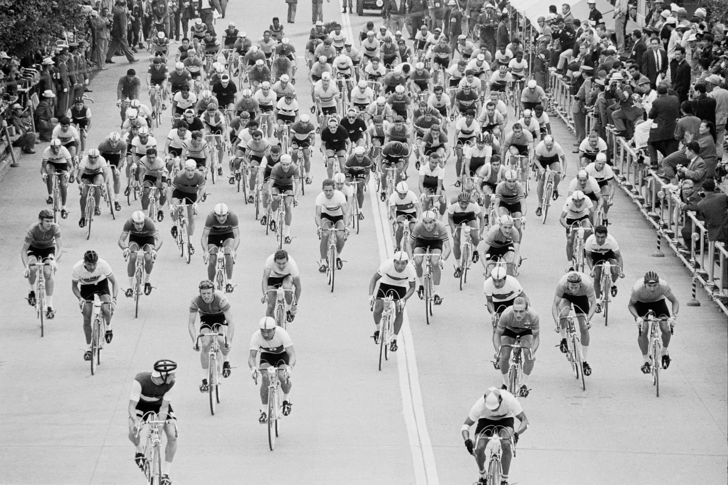 a black and white photograph The start of the Men's individual cycle road race on 22nd October 1964 during the XVIII Summer Olympic Games.