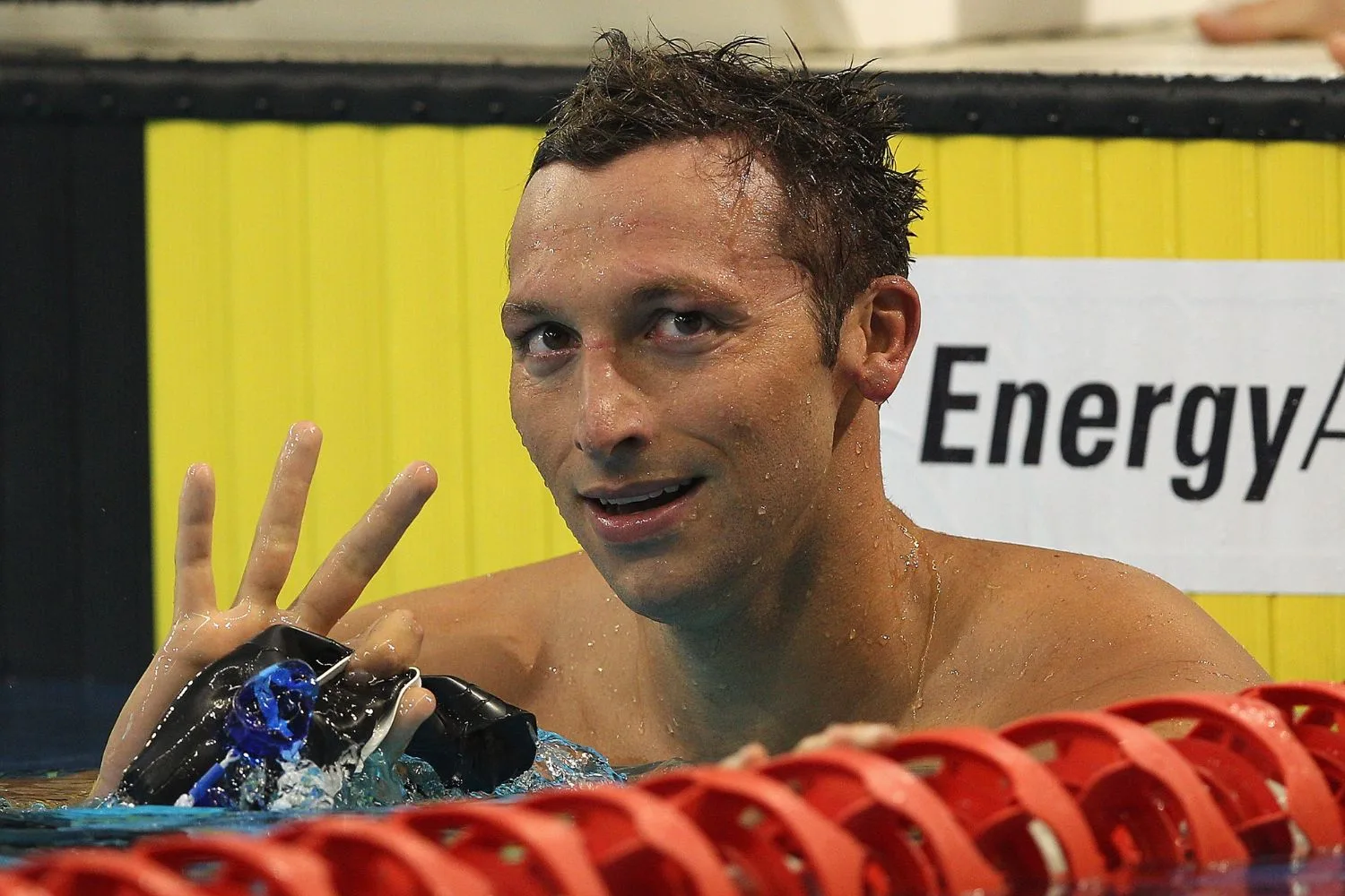 Ian Thorpe of Australia waves to the crowd after competing in the Men's 200 Metre Freestyle trials
