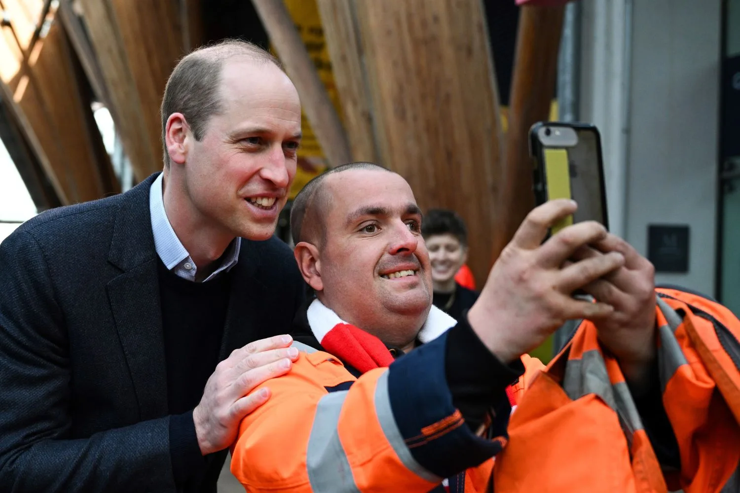 prince william taking a selfie with the homeless during on of his visits