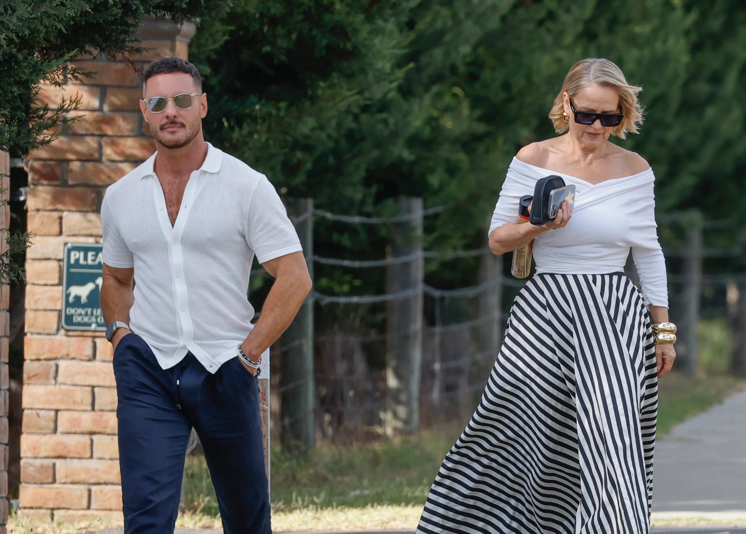 Darren Palmer and Shaynna Blaze walking down the street