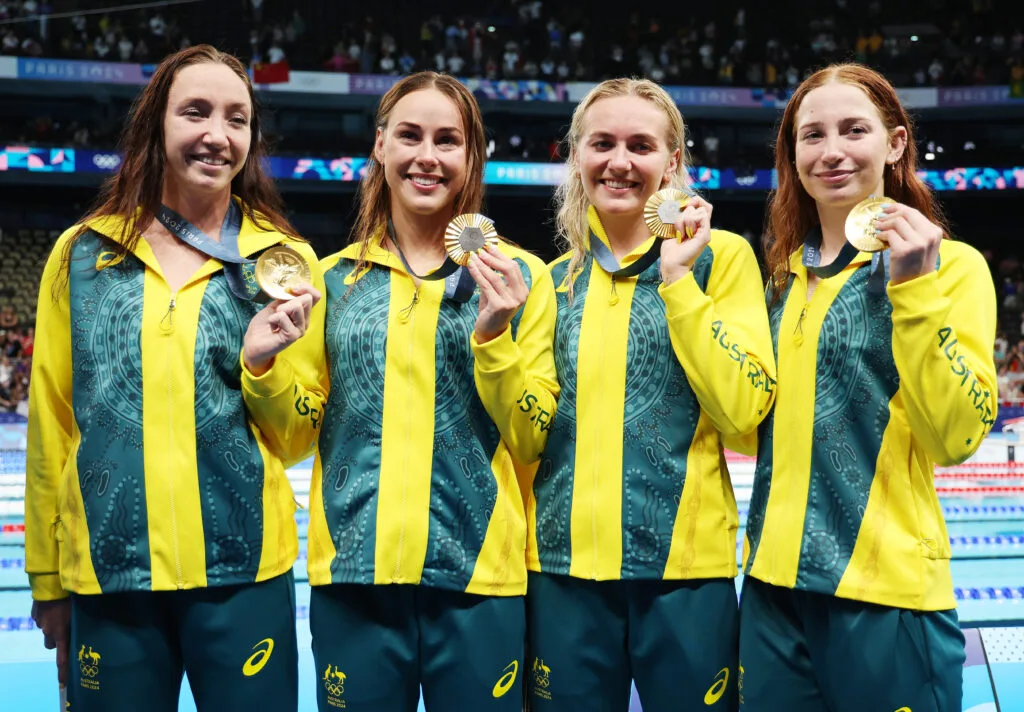 NANTERRE, FRANCE - AUGUST 01: Gold Medalists Mollie O’Callaghan, Lani Pallister, Brianna Throssell and Ariarne Titmus of Team Australia pose following the Swimming medal ceremony after the Women's 4x200m Freestyle Relay Final on day six of the Olympic Games Paris 2024 at Paris La Defense Arena on August 01, 2024 in Nanterre, France. (Photo by Ian MacNicol/Getty Images)