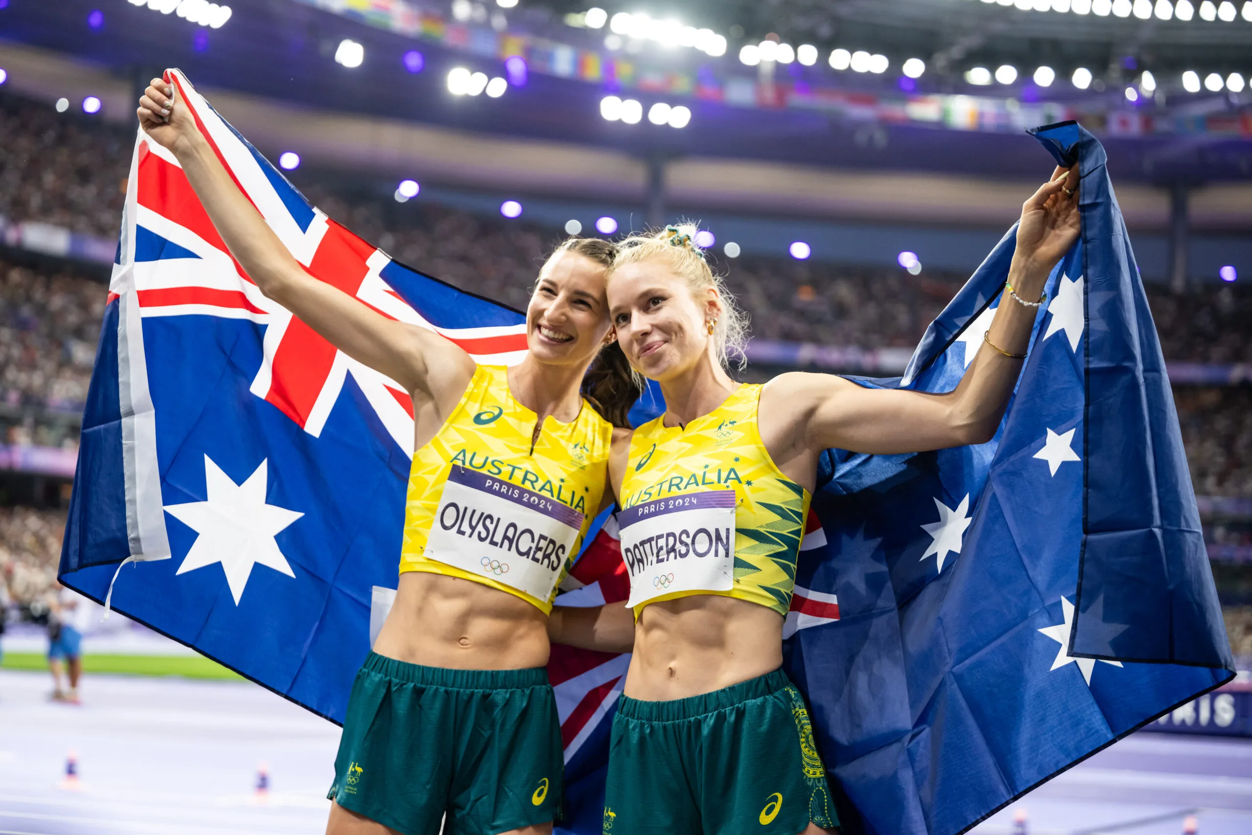 PARIS, FRANCE - AUGUST 4: Silver medalist Nicola Olyslagers of Team Australia celebrates with teammate and bronze medalist Eleanor Patterson of Team Australia after the Women's High Jump Final on day nine of the Olympic Games Paris 2024 at Stade de France on August 4, 2024 in Paris, France. (Photo by Kevin Voigt/GettyImages)