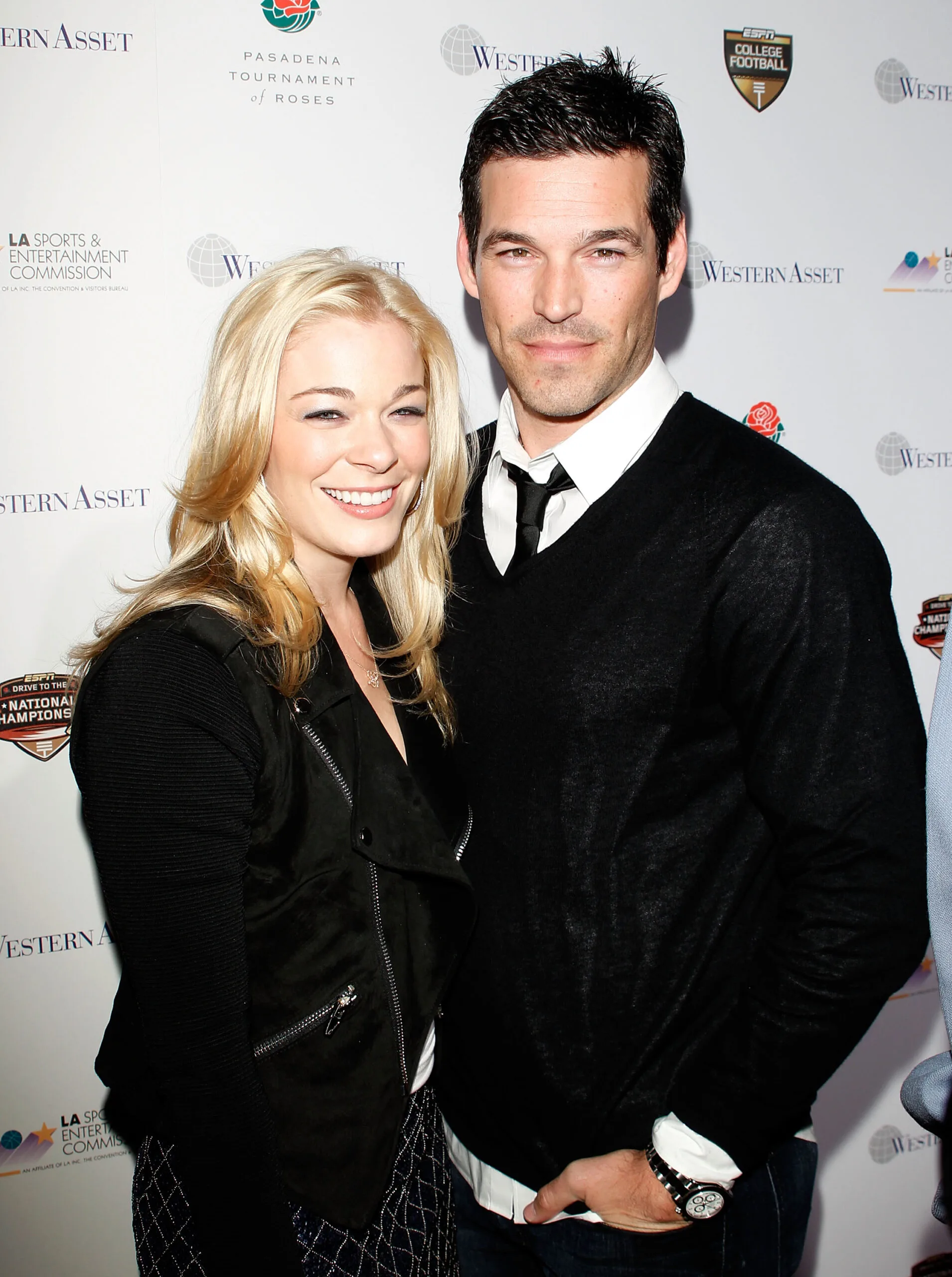 PASADENA, CA - JANUARY 06:  Singer LeAnn Rimes (L) and actor Eddie Cibrian arrive to the 2010 Official BCS National Championship Party held at Pasadena Convention Center on January 6, 2010 in Pasadena, California.  (Photo by Michael Tran/FilmMagic)