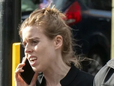 Princess Beatrice looking stressed on the phone in london