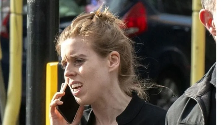 Princess Beatrice looking stressed on the phone in london