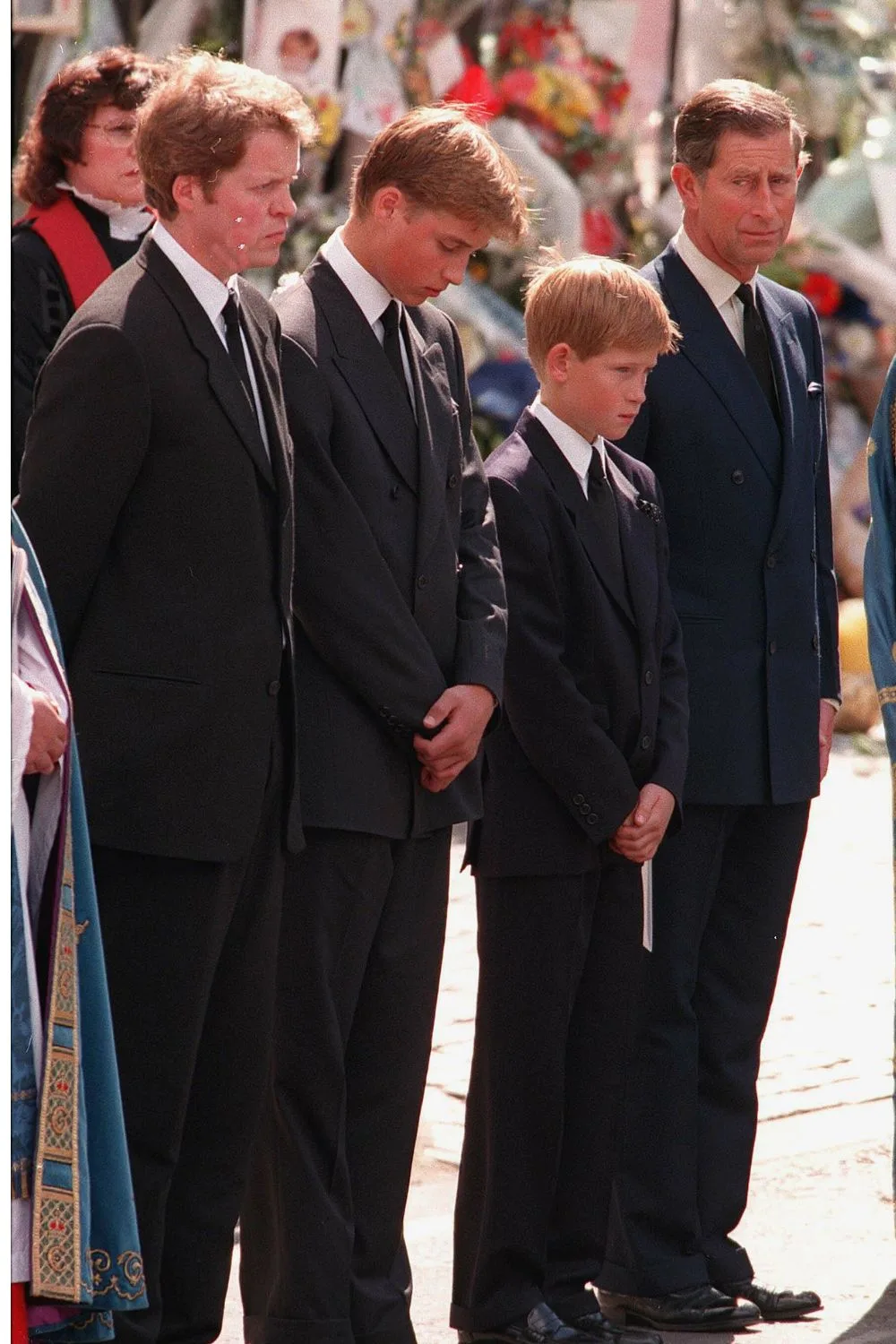 The infamous photo of Prince Harry walking alongside his mother coffin