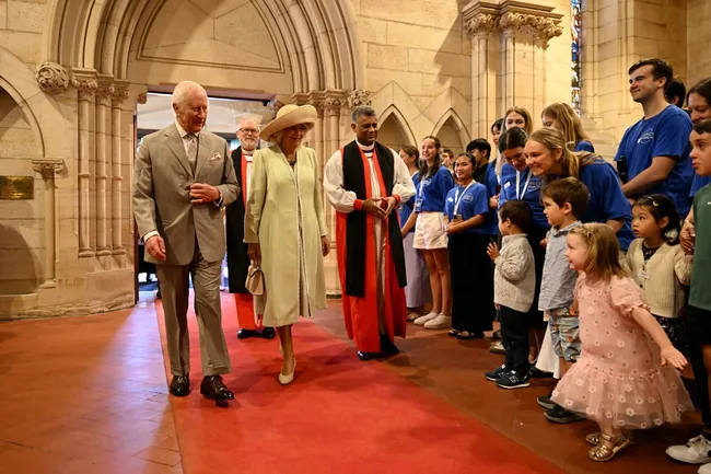 king charles queen camilla child curtsy