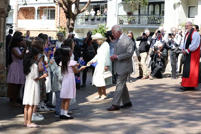 king charles queen camilla meet local children