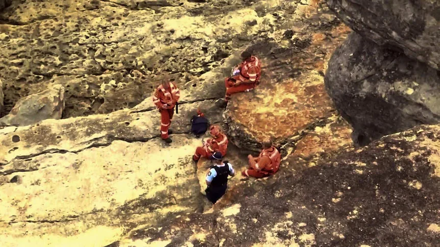 Search for Caddick's shoe on beach