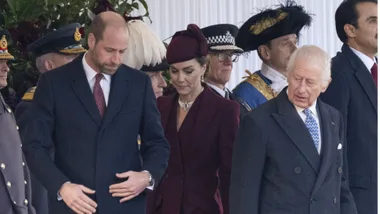 Unsmiling Prince William, Princess Kate and King Charles