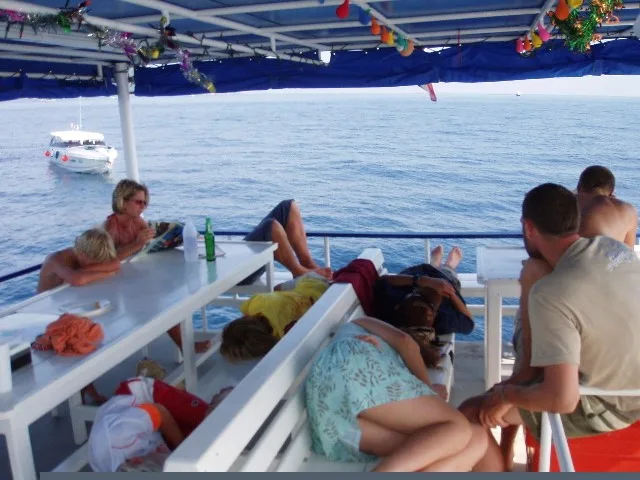 lizz and her diving group out at sea on boat