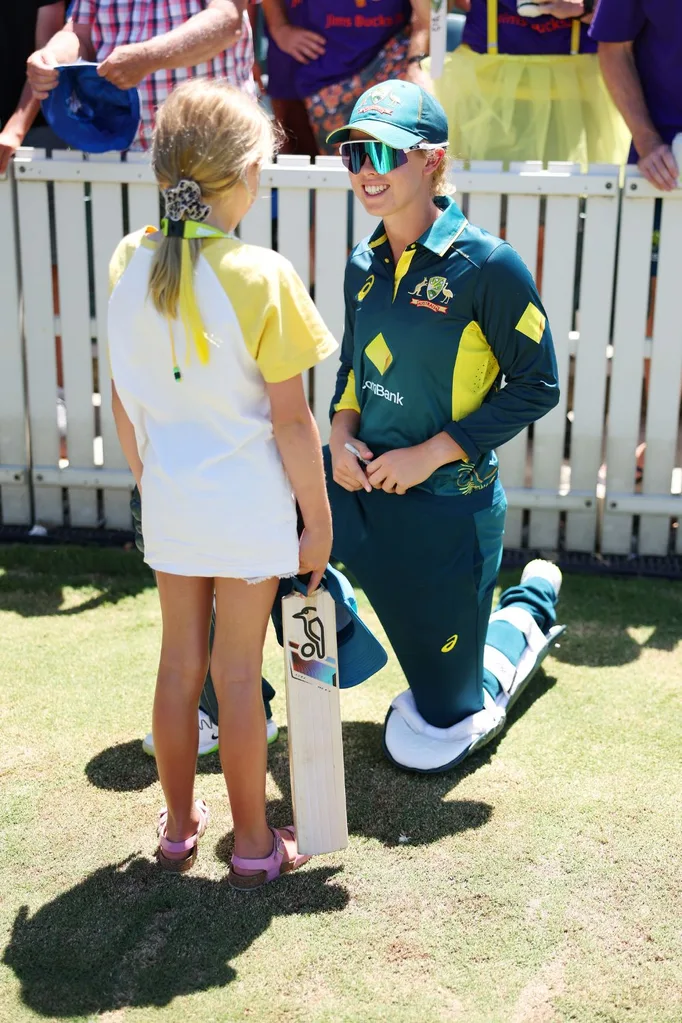 phoebe litchfield with a young cricket fan