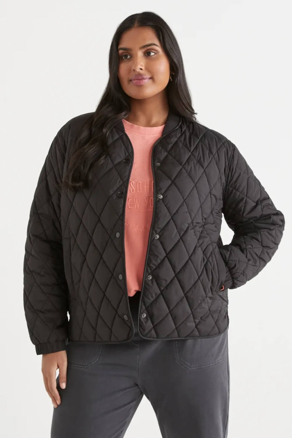Sussan model wearing quilted black jacket best plus size clothing brands