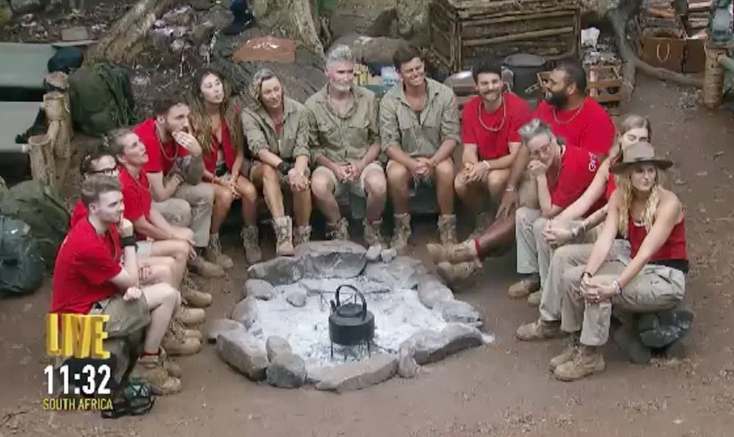 2025 I'm a celebrity cast sat around campfire
