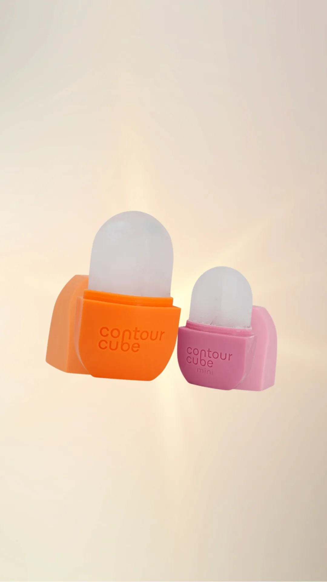 Orange and pink coloured ice contour cubes