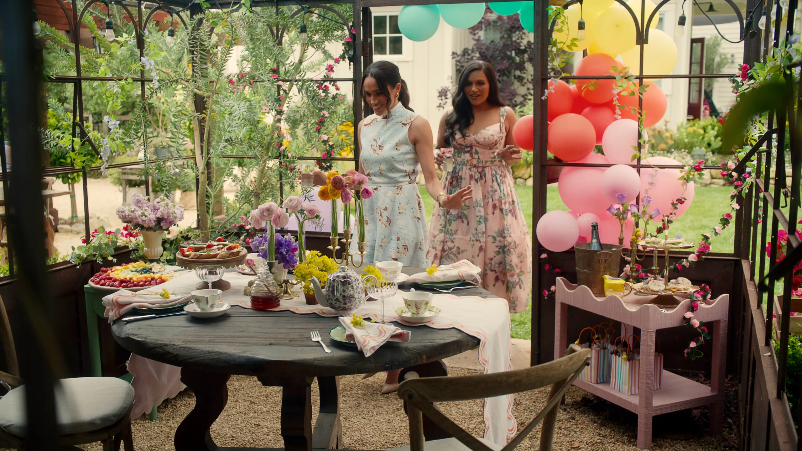 Meghan Markle and Mindy Kaling in an episode of With Love, Meghan