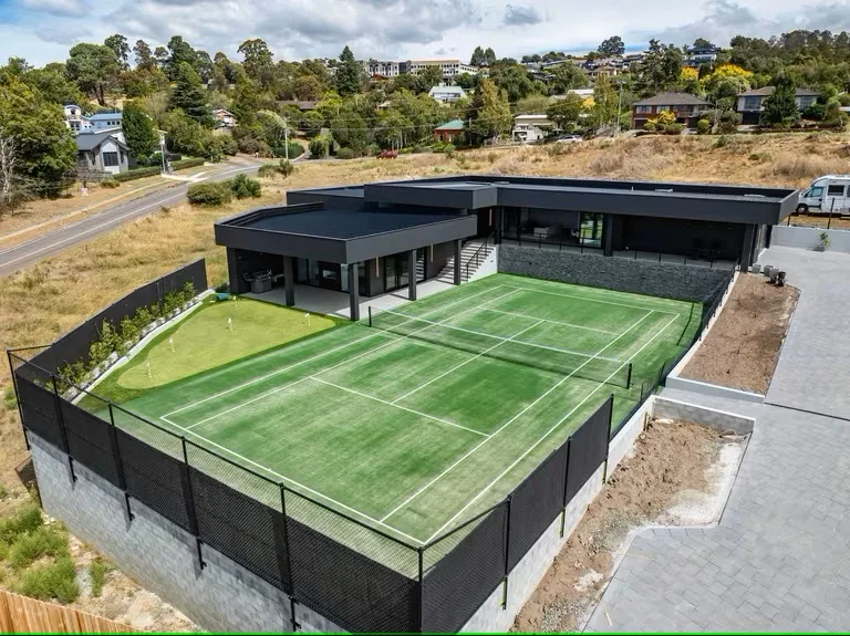 clint mansion with tennis court