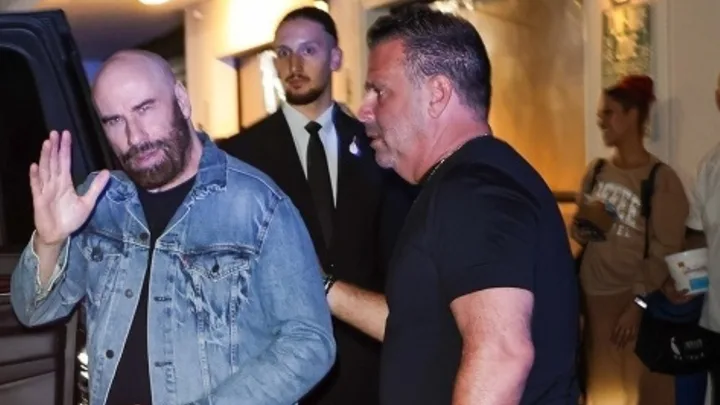 John Travolta outside car with Randall Emmett