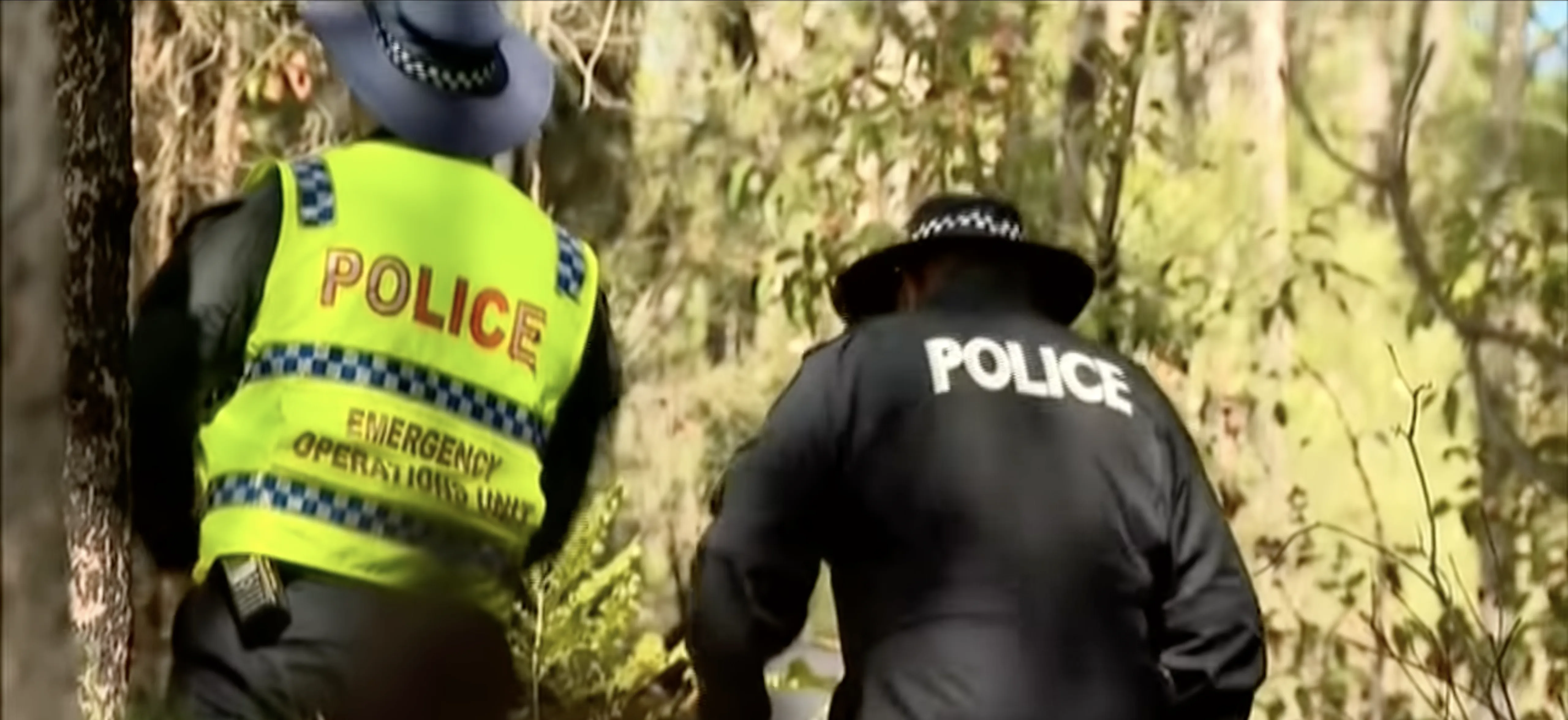 Police looking through crime scene