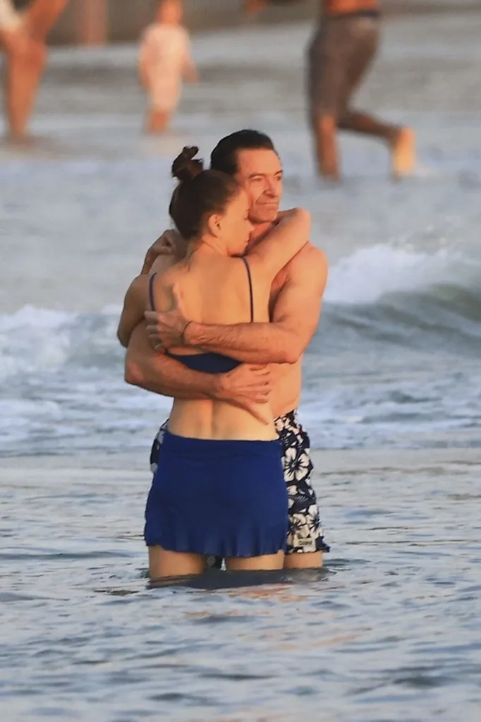 Hugh Jackman and Sutton Foster embracing in Costa Rica