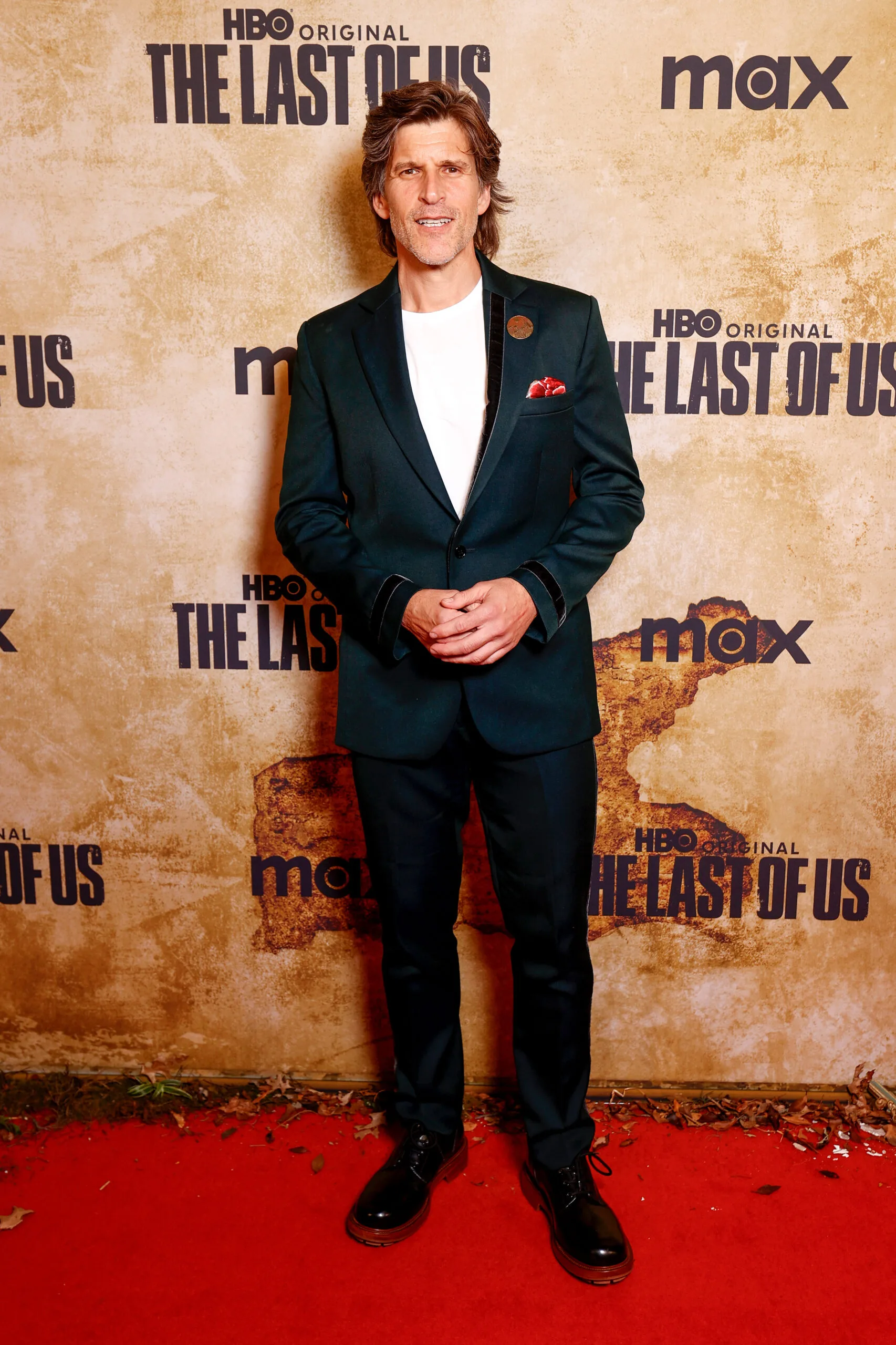 Osher Gunsberg wearing a suit