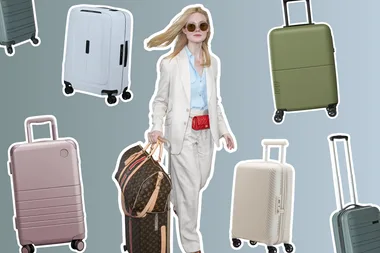 Elle fanning with suitcase surrounded by other carry on luggage